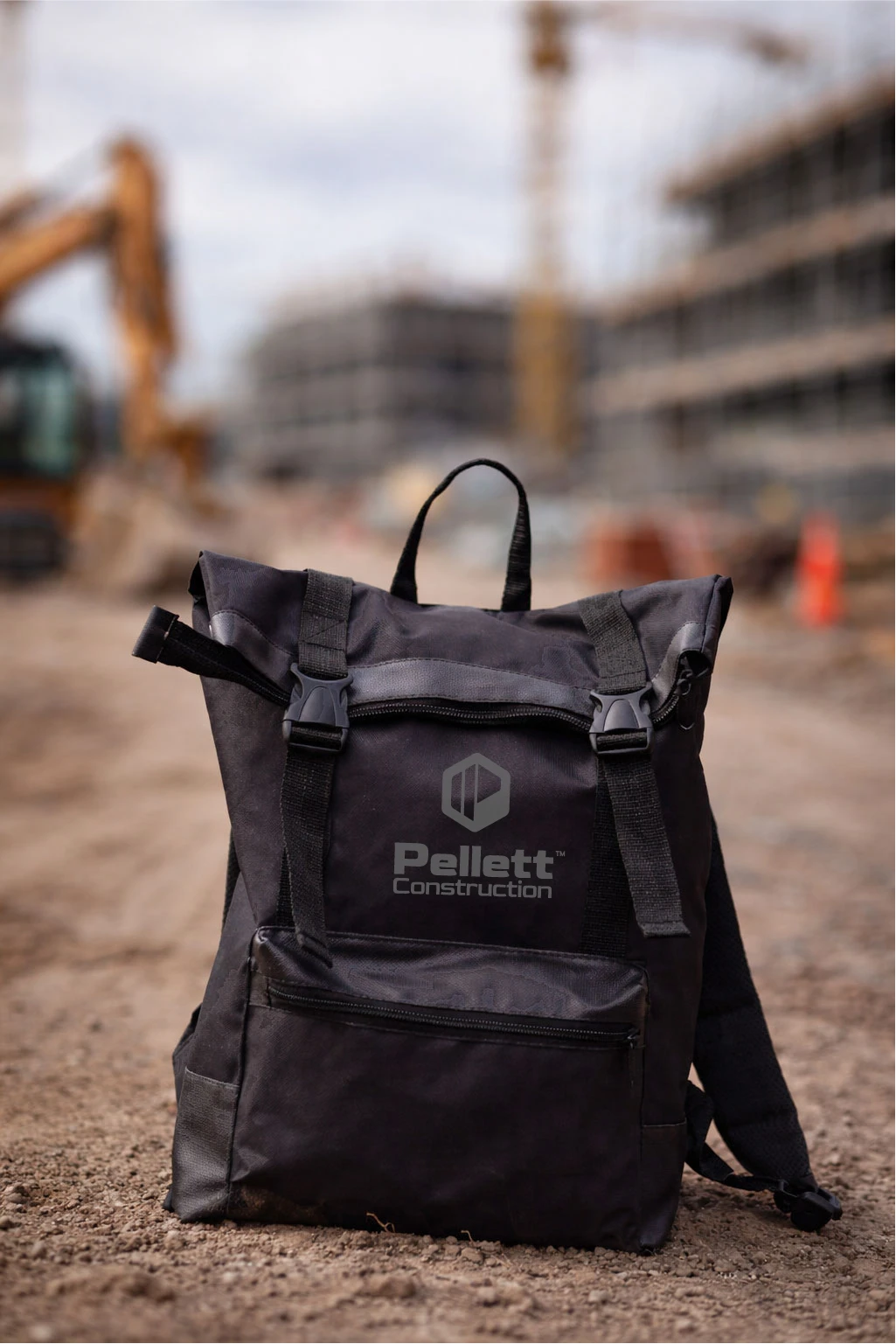 Mockup of a Pellett Construction backpack at a job site.
