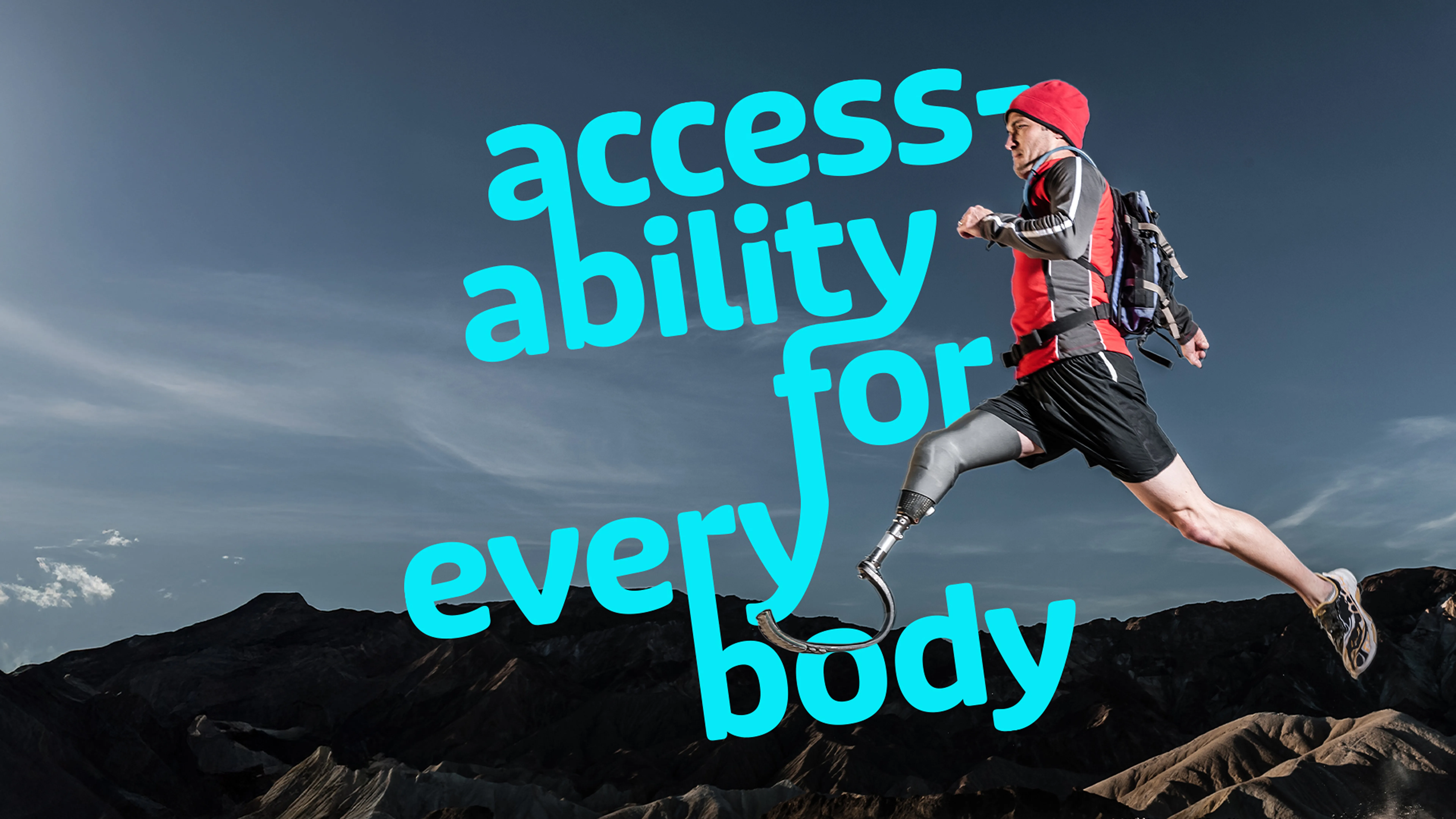 Adaptive athlete running with mountain background and rally cry: 'accessability for every body'