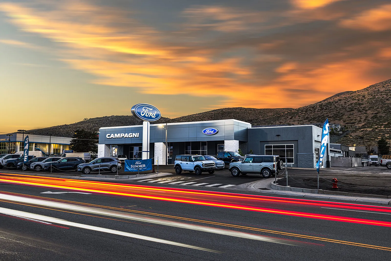 Ford-exterior signagge 1 Sunset photograph of the the exterior of Campagni Ford