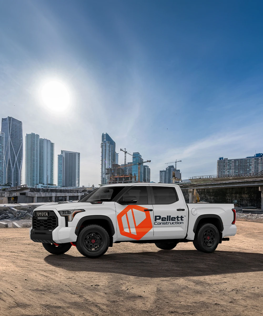 A Pellett construction truck parked at a job site