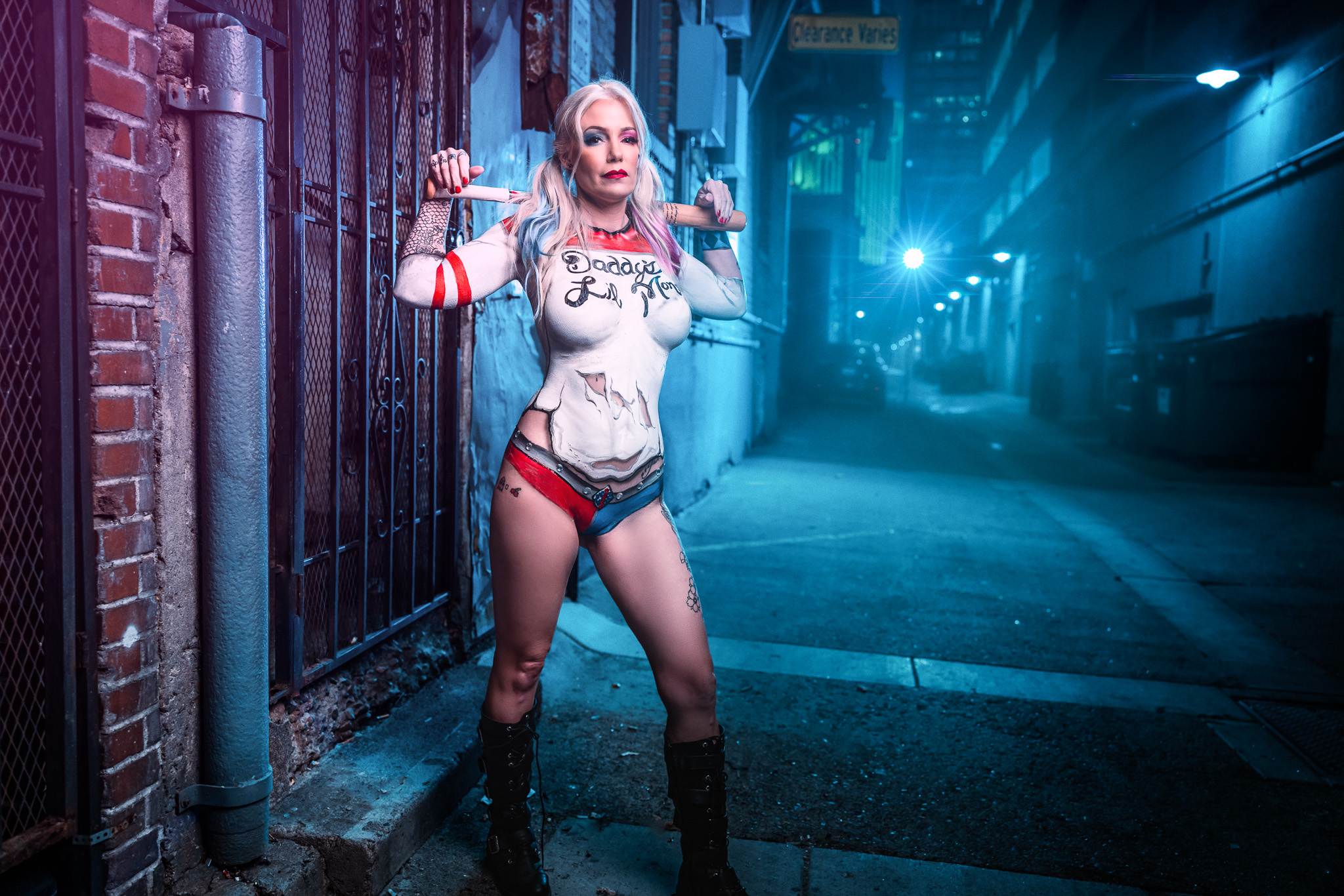 Advertising creative photography Harley Quinn in alleyway